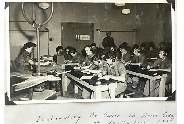 Mrs Merle Taylor instruction air cadets in morse code.